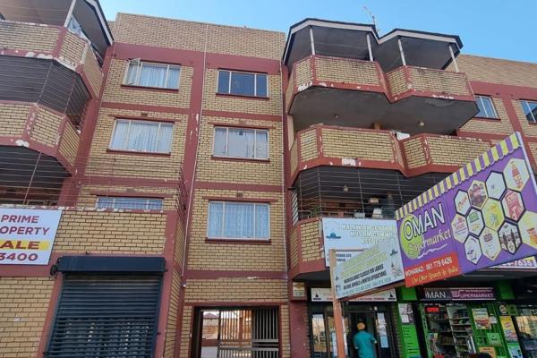 This prime apartment building is strategically located on along a busy main road, this property offers significant potential for both ...