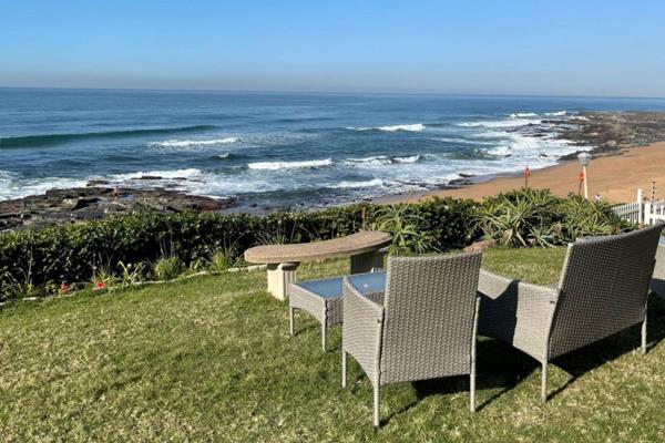 Immaculate Holiday Apartment on Ballito beach front. 

Open plan lounge with American shutters and doors onto grassed garden area. Open ...