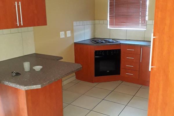 This 2 bedroom flat in a security complex  is immediately available and ready to move in.   
It offers large rooms and a braai on the ...