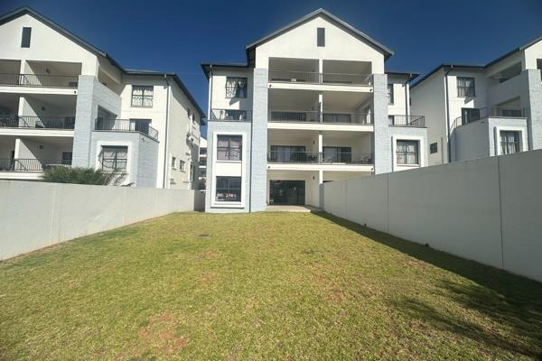 Entrance hall, lounge and dining area leading onto covered patio overlooking the garden
Kitchen with appliances included and gas ...