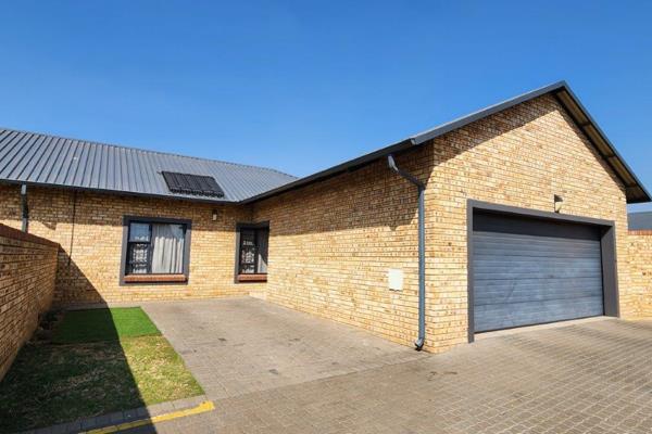 This stunning modern face brick cluster is a turn-key home..Move in and enjoy the ...