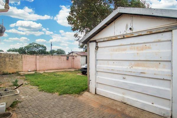 The house has a kitchen with separate lounge.  The original veranda has been enclosed ...