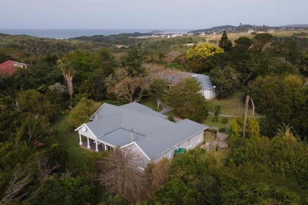 This pristine and secure 2.2  hectare estate boasts three exquisite dwellings, featuring six well-appointed rooms, making it an ideal ...