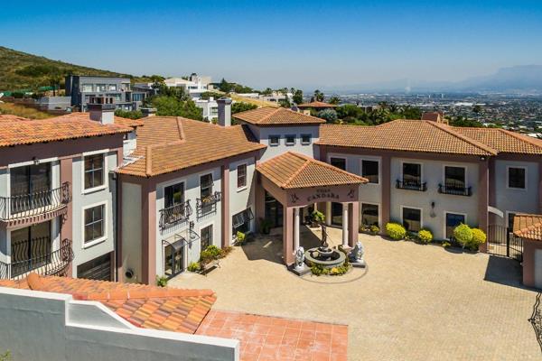 Welcome to this Spanish styled villa, located in the heart of Plattekloof. This stunning home is defined by luxury, and invites nature ...