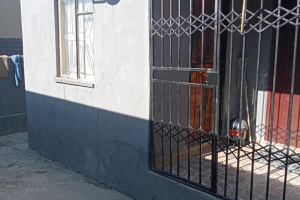 House for sale in Tembisa Central with four outside rooms with a big yard and the house ...