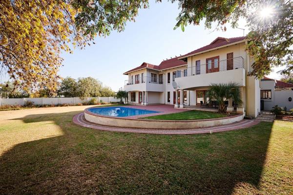 This Tuscan family home is located in Carlswald Estate. The estate offers a secure ...