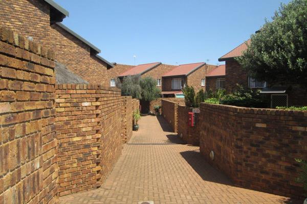 Affordable sectional title face brick duplex townhouse with three bedrooms and two bathrooms in secure heidelberg central complex with ...