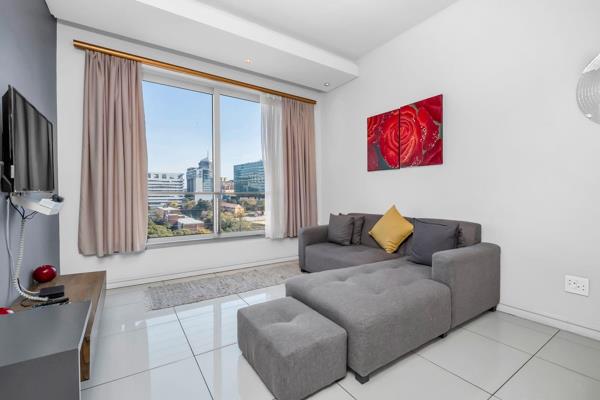 Welcome to the pinnacle of luxury and convenience in the vibrant heart of Sandton. Nestled within an elite building that seamlessly ...