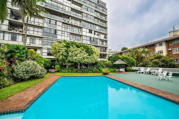 This exquisite apartment features an open-plan dining and lounge area, complemented by ...