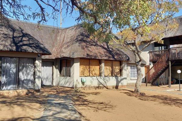 DELIGHTFUL BUSHVELD HOME situated in an Eco Estate called Rooibergkrans, on a game farm ...