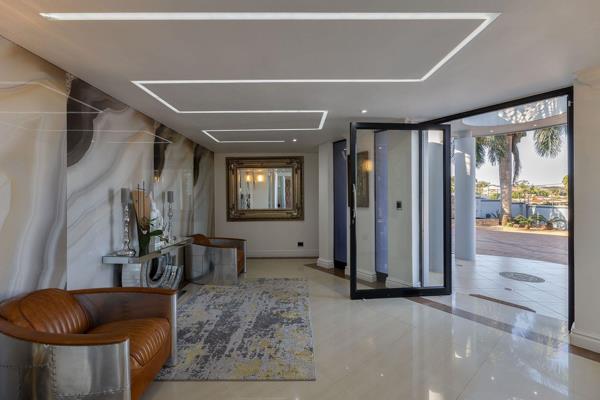 From the moment you enter the impressive entrance hall, you’ll sense the elegance and luxury that awaits. The open-plan living area ...