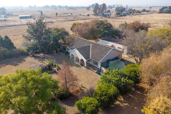 This expansive agriculture holding is situated on a sprawling property, the main residence boasts four generously sized bedrooms, each ...