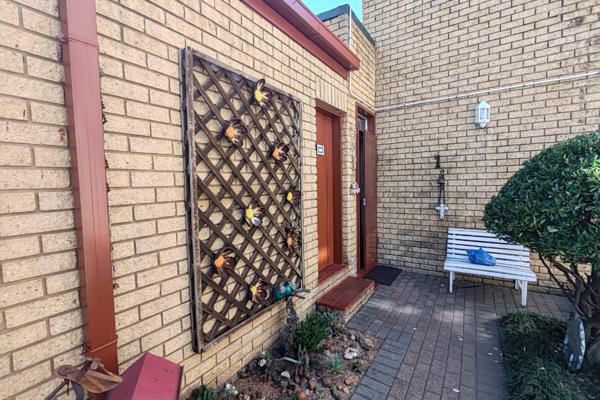 The front door opens to an inviting open-plan lounge and dining room area, adjacent to a well-equipped kitchen with ample built-in ...