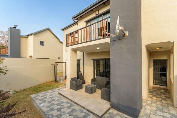 Discover this stunning 3-bedroom duplex townhouse, located in the secured, boom-gated ...