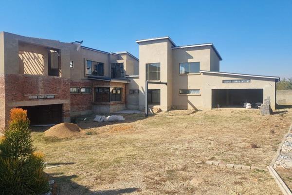 ON SHOW SUNDAY 27 OCTOBER 11H00 - 14H00

An entertainers dream with magnificent hilltop views,
This half completed grandious home will ...