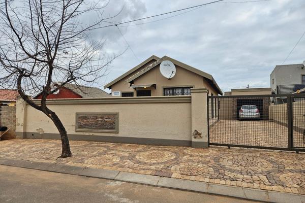 This beautiful home in Protea Glen offers a perfect blend of comfort .  It is ideal for ...