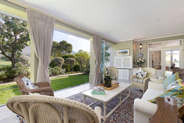 A grand entrance hall leading to the living spaces showcases the elegance and generous proportions this home has to offer.  

The ...