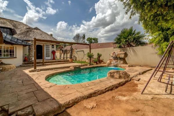 This home nestled in a serene location features 4 bedroom thatch , perfect blend of ...