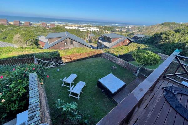 Wonderful 180 degree sea views from this three bedroom home situated in a secure townhouse complex. The living room opens out to a ...