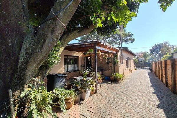 Explore this immaculate property in the desirable Pretoria Gardens neighborhood ...