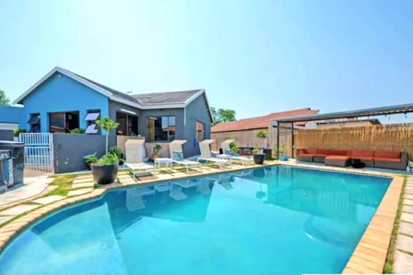 Modern three bedroom home | heated swimming pool | flatlet | office space | solar panels ...