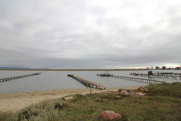 This river frontage plot in Laaiplek, Rooibaai is truly a rare gem, offering one of the ...