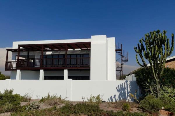 This exceptional property in Elands Bay offers a rare opportunity for a large family ...