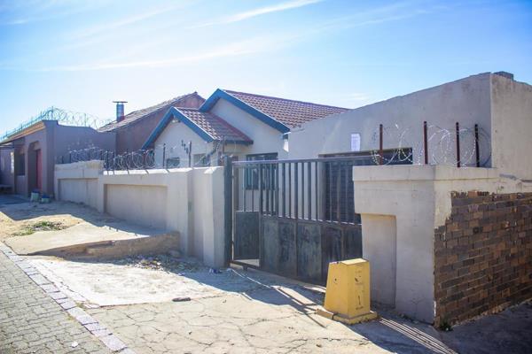 A house in Riverlea ext 5, Johannesburg. The property features 2 bedrooms, a sitting room, a kitchen, a bathroom, a single garage, 3 ...