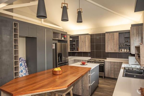 This beautifully renovated family home features sunny living areas which flow onto a ...