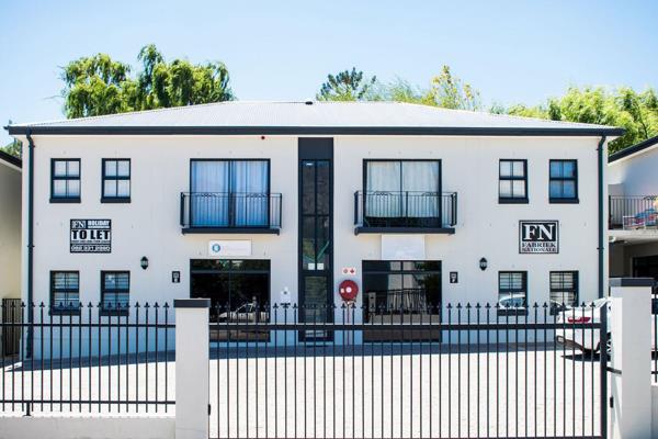 This spacious, unfurnished ground-floor commercial unit in Franschhoek offers a prime location for your business. The total area is ...