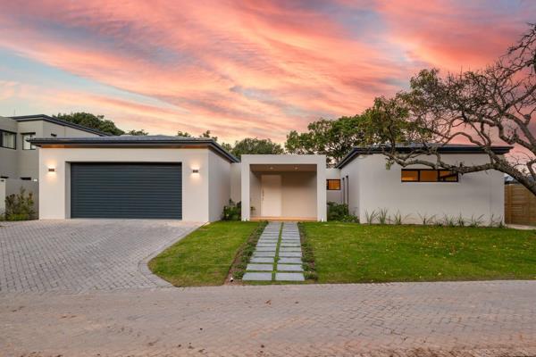 Nestled in the highly sought-after estate along the picturesque Keurbooms River in Plettenberg Bay, this newly constructed home is a ...