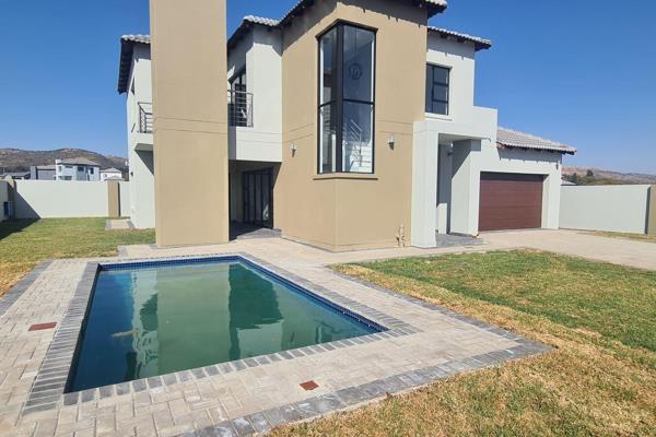 Discover your dream home in the heart of Hartbeespoort, where luxury living meets natural beauty. This exceptional 4-bedroom, all ...