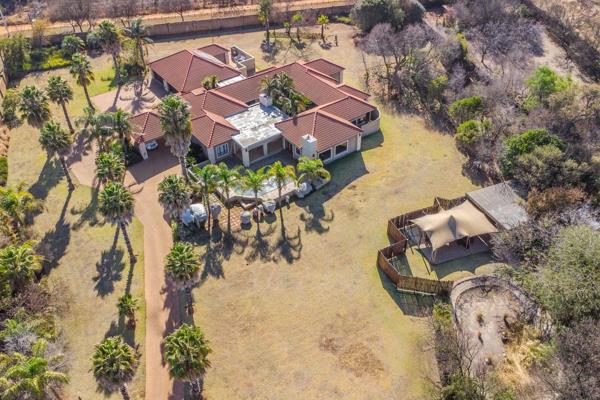 Discover the ultimate blend of luxury and potential with this 5.5 ha estate just minutes from Silver Lakes, bordering the serene ...