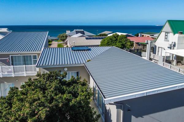 Escape to a delightful holiday home in the picturesque town of Hartenbos, where the serene beach and convenient amenities are just a ...