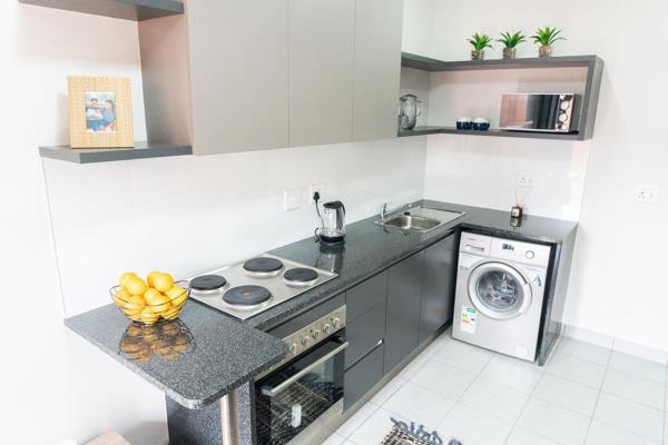 Modern 2 bedroom 2 Bathroom open plan Kitchen and Lounge. Close to Gautrain station ...