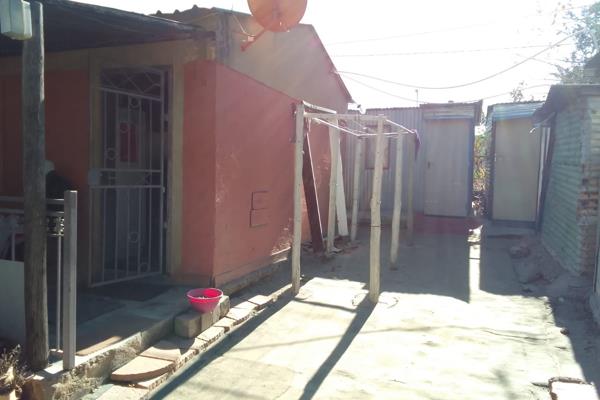 An open plan rdp for sale in diepsloot. 
The property comes with a full bathroom,
1 outside toilet and 8 shacks that generates R6000 ...