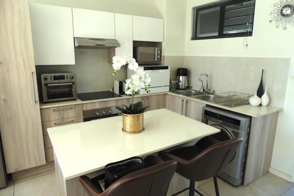 Welcome to this immaculate top floor apartment in Orchid Ridge security estate
Beautiful ...