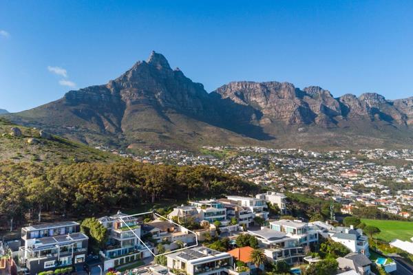 An opportunity to purchase a valuable property on one of the most desirable roads in Camps Bay with 360 degree views.

This double ...