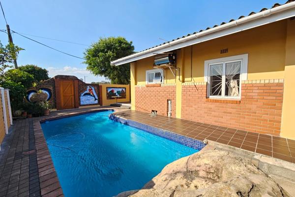 Chas Everitt Durban South proudly presents this beautifully maintained family home in the heart of Austerville. 

When stopping outside ...