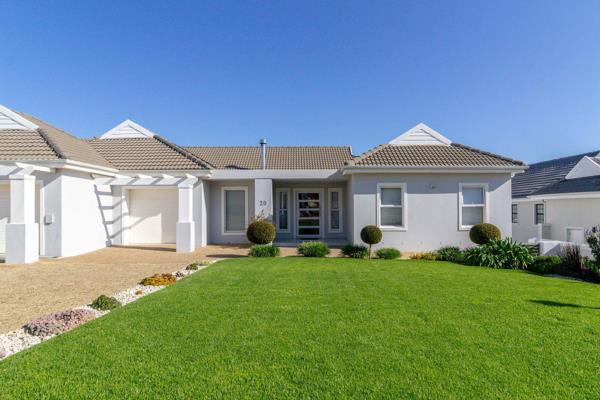 Welcome to the pinnacle of sophisticated living, nestled in the serene embrace of Zevenwacht Country Estate. This architectural ...