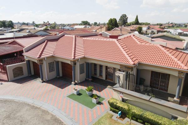 This Splendid Large Family Home Is Located In Lenasia Ext 11A Just Minutes Away From Trade Route Mall, K43 &amp; Other Main Roads &amp; ...