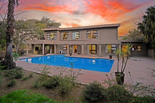 This stunning home is perfectly positioned with great road exposure and quick access to Rivonia Road and Highway Turnoff.

Magnificent ...