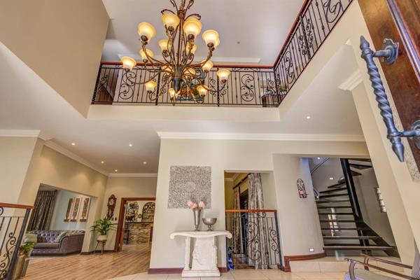 Nestled within the tranquil and verdant Benoni AH area, this sprawling estate spanning 1.6 hectares presents an extraordinary ...