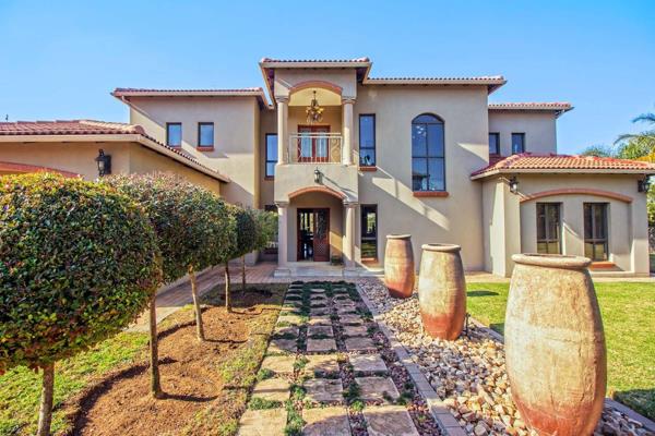 When you step into this home, you are greeted my an impressive open-plan living space! An impressive foyer with beautiful archways ...