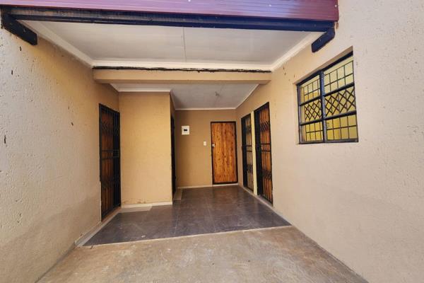 The three separate huge and very neat bedrooms which share a very decent shower and a toilet are located near the taxi rank, a filing ...