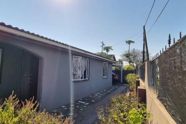 Explore this four-bedroom home in Gingindlovu, offering ample space and potential. Two bedrooms include built-in cupboards, alongside ...