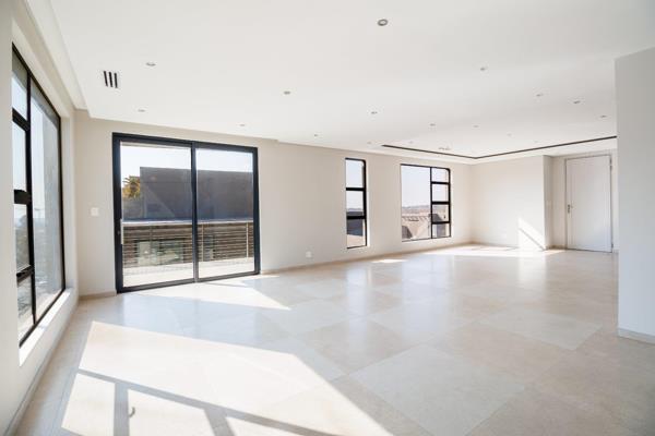 Elegant and modern living with this exceptional penthouse spread across 3 levels ...