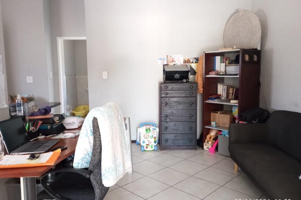 Two Bedroom Upstairs Unit with large Covered Patio and built-in braai. Tiled throughout. Two bedrooms with built-in cupboards. One full ...