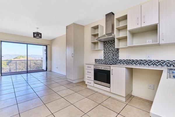 A chic neat, light and bright unit. Extremely central. Gautrain Stations, superb shops ...