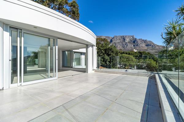 Your own piece of paradise awaits you. This triple storey home was built to entertain, boasting uninterrupted views of Table Mountain ...